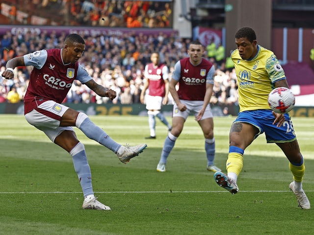 Aston Villa's Ashley Young in action with Nottingham Forest's Danilo on April 8, 2023