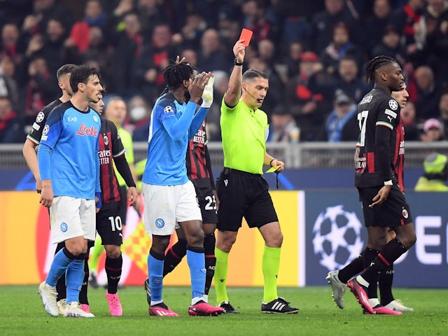 Napoli's Andre-Frank Zambo Anguissa is shown a red card by referee Istvan Kovacs on April 12, 2023