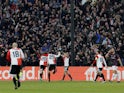 Feyenoord's Mats Wieffer celebrates scoring their first goal with Oussama Idrissi and Santiago Gimenez on April 13, 2023