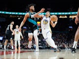 Golden State Warriors shooting guard Jordan Poole (3) drives to the basket while guarded by Portland Trail Blazers power forward Brendon Watford (2) on April 9, 2023