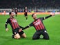 AC Milan's Ismael Bennacer celebrates scoring their first goal with Davide Calabria on April 12, 2023