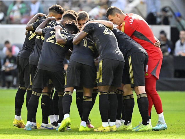 Los Angeles FC players huddle on the field prior to the game on April 9, 2023