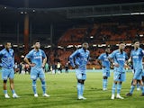 Marseille players look dejected after the match on April 9, 2023