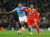 Manchester City's Rodri in action with Bayern Munich's Leroy Sane on April 11, 2023