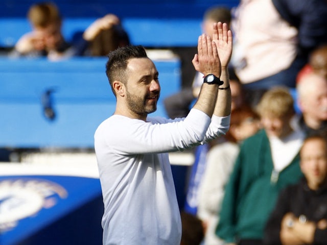 Brighton & Hove Albion manager Roberto De Zerbi applauds fans after the match on April 15, 2023