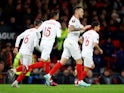 Sevilla's Lucas Ocampos celebrates their first goal an own goal scored by Manchester United's Tyrell Malacia on April 13, 2023
