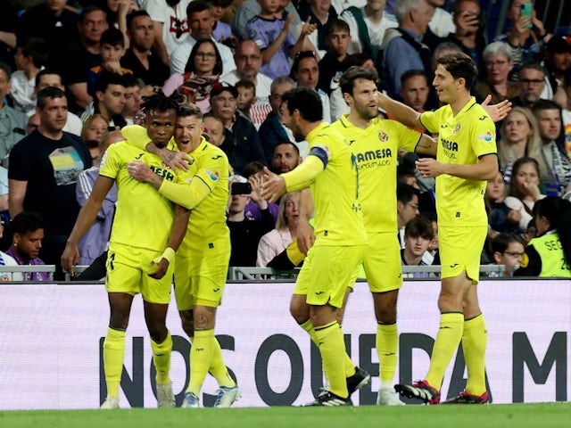 Villarreal's Samu Chukwueze celebrates scoring their third goal with teammates on April 8, 2023