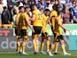 Wolverhampton Wanderers' Matheus Nunes celebrates scoring their first goal with teammates on April 8, 2023