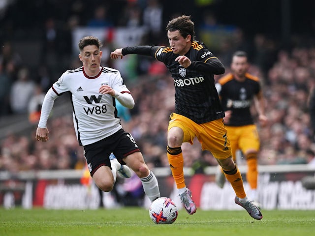 Leeds United's Brenden Aaronson in action with Fulham's Harry Wilson on April 22, 2023
