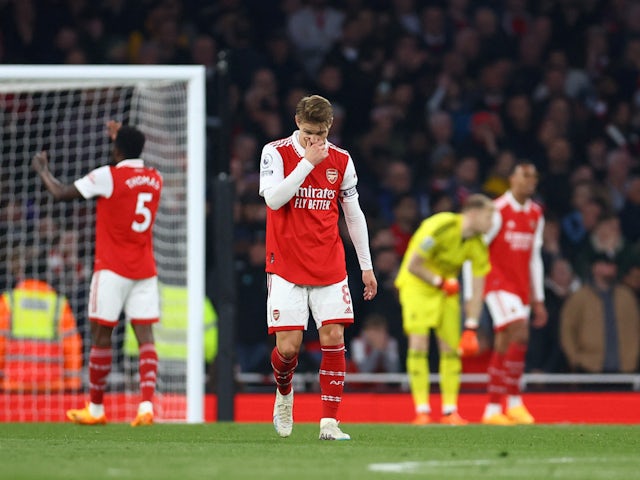 Arsenal players look dejected after Theo Walcott scores for Southampton on April 21, 2023