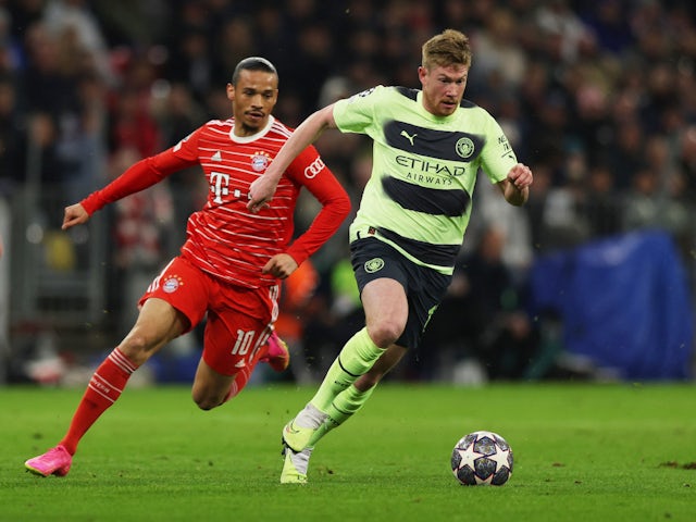 Manchester City's Kevin De Bruyne in action with Bayern Munich's Leroy Sane on April 19, 2023