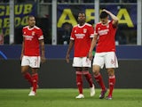 Benfica's Antonio Silva and teammates look dejected after Inter Milan's Nicolo Barella scores their first goal on April 19, 2023