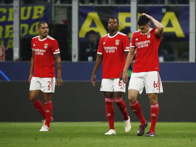 Benfica's Antonio Silva and teammates look dejected after Inter Milan's Nicolo Barella scores their first goal on April 19, 2023