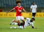Benfica's Diego Moreira in action with Fulham's Nathaniel Chalobah on July 17, 2022