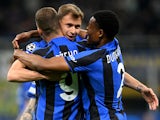 Inter Milan's Nicolo Barella celebrates scoring their first goal with Denzel Dumfries and Edin Dzeko on April 19, 2023