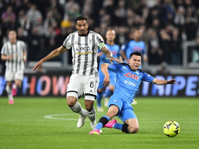 Juventus' Danilo in action with Napoli's Hirving Lozano on April 23, 2023