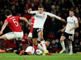 Manchester United's Lisandro Martinez in action with Charlton Athletic's Miles Leaburn on January 10, 2023