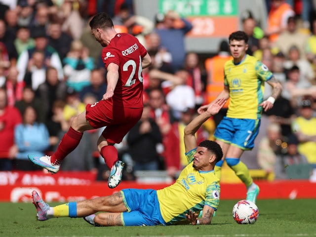 Liverpool's Andrew Robertson in action with Nottingham Forest's Morgan Gibbs-White on April 22, 2023