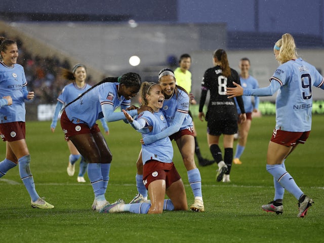 Manchester City Women's Steph Houghton celebrates scoring their fifth goal on April 23, 2023