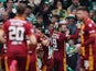 Motherwell's Kevin van Veen celebrates with teammates after scoring their first goal on April 22, 2023
