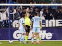 Sporting Kansas City defender Robert Castellanos (19) receives a red card from referee Tim Ford on April 16, 2023