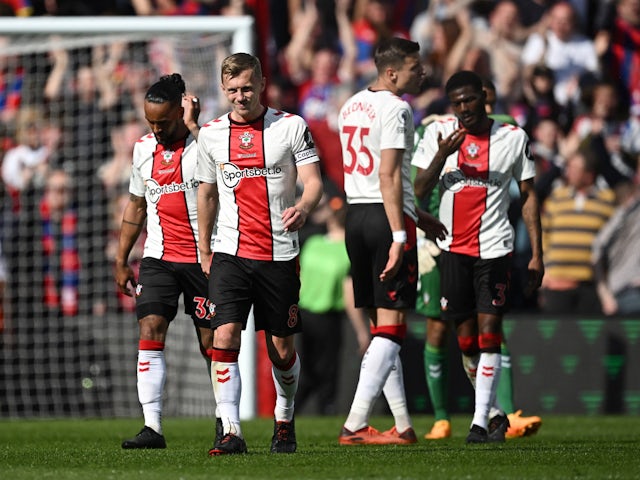 Southampton's James Ward-Prowse and Theo Walcott react on April 15, 2023