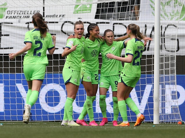 VfL Wolfsburg Women's Sveindis Jane Jonsdottir celebrates scoring their second goal with teammates on April 23, 2023