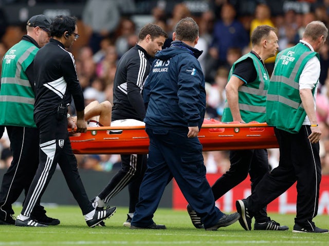 Fulham's Andreas Pereira is stretchered off after sustaining an injury on April 30, 2023