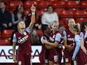 Aston Villa Women's Rachel Daly celebrates scoring their second goal with teammates on April 28, 2023