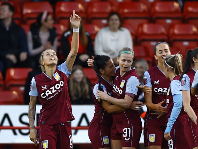 Aston Villa Women's Rachel Daly celebrates scoring their second goal with teammates on April 28, 2023