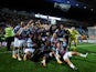 Burnley players celebrate on the pitch after winning the match to become champions on April 25, 2023