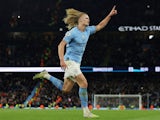 Manchester City's Erling Braut Haaland celebrates scoring their fourth goal on April 26, 2023