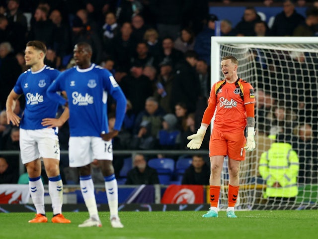 Everton's Jordan Pickford reacts after Newcastle United's Callum Wilson scored their third goal on April 27, 2023