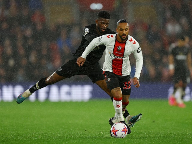 Southampton's Theo Walcott in action with Bournemouth's Jefferson Lerma on April 27, 2023