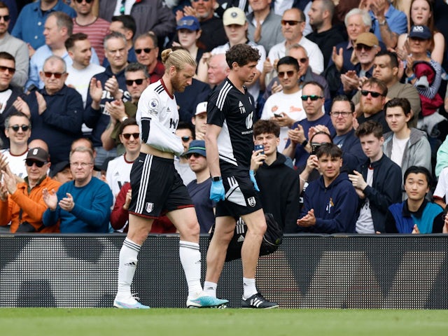 Fulham's Tim Ream walks off the pitch after sustaining an injury on April 30, 2023