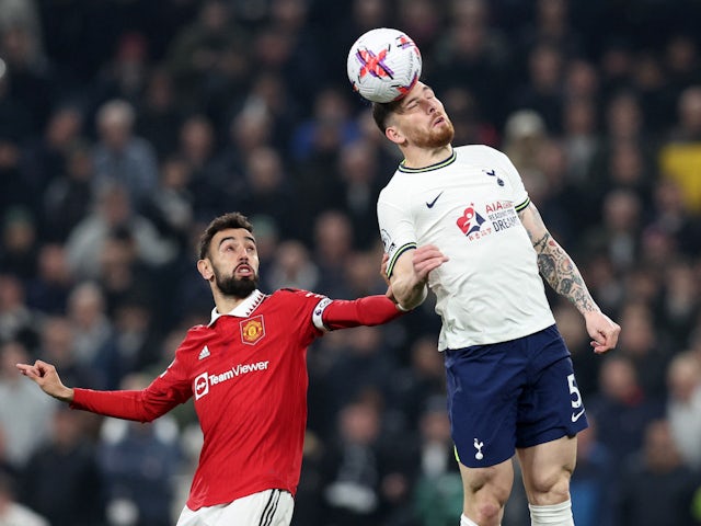Manchester United's Bruno Fernandes in action with Tottenham Hotspur's Pierre-Emile Hojbjerg on April 27, 2023