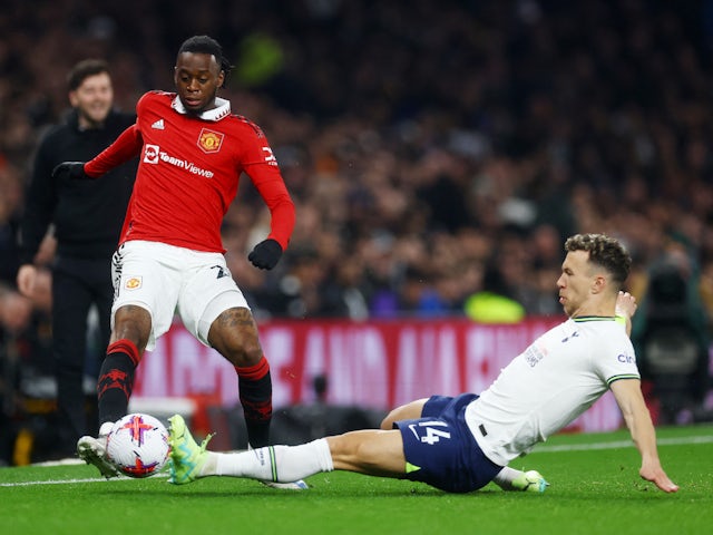 Manchester United's Aaron Wan-Bissaka in action with Tottenham Hotspur's Ivan Perisic on April 27, 2023
