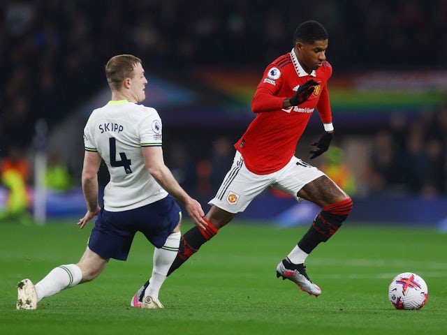 Tottenham Hotspur's Oliver Skipp in action with Manchester United's Marcus Rashford on April 27, 2023