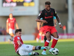 Morecambe's Jake Taylor in action with Stoke City's Tyrese Campbell on August 9, 2022