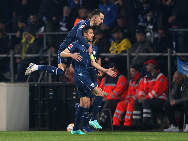 VfL Bochum's Anthony Losilla celebrates scoring their first goal with Erhan Masovic on April 28, 2023