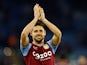 Aston Villa's Alex Moreno applauds fans after the match on April 4, 2023