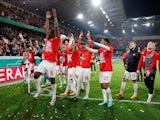 RB Leipzig's Amadou Haidara with teammates celebrate after the match on May 2, 2023