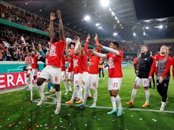 RB Leipzig's Amadou Haidara with teammates celebrate after the match on May 2, 2023