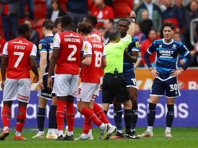 Middlesbrough's Anfernee Dijksteel is shown a red card by referee Keith Stroud on May 1, 2023