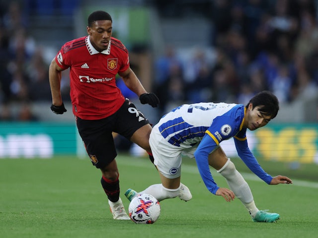 Manchester United's Anthony Martial in action with Brighton & Hove Albion's Kaoru Mitoma on May 4, 2023