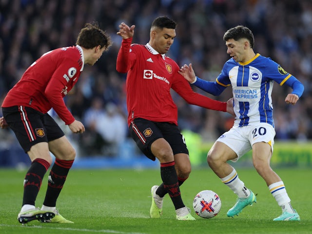 Manchester United's Casemiro in action with Brighton & Hove Albion's Julio Enciso on May 4, 2023