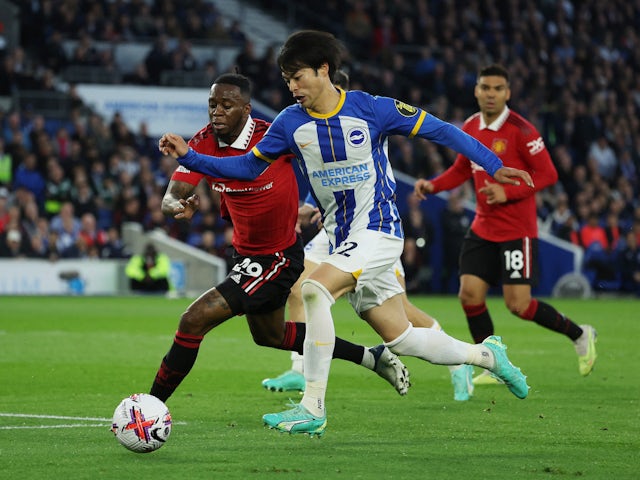 Brighton & Hove Albion's Kaoru Mitoma in action with Manchester United's Aaron Wan-Bissaka on May 4, 2023