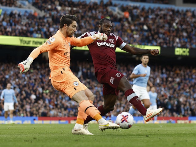 Manchester City's Stefan Ortega in action with West Ham United's Michail Antonio on May 3, 2023