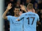 Manchester City's Nathan Ake celebrates scoring their third goal with Manchester City's Kevin De Bruyne on December 22, 2022