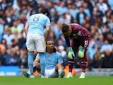 Manchester City's Nathan Ake goes down injured on May 6, 2023